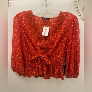 Adorable orange flowered top